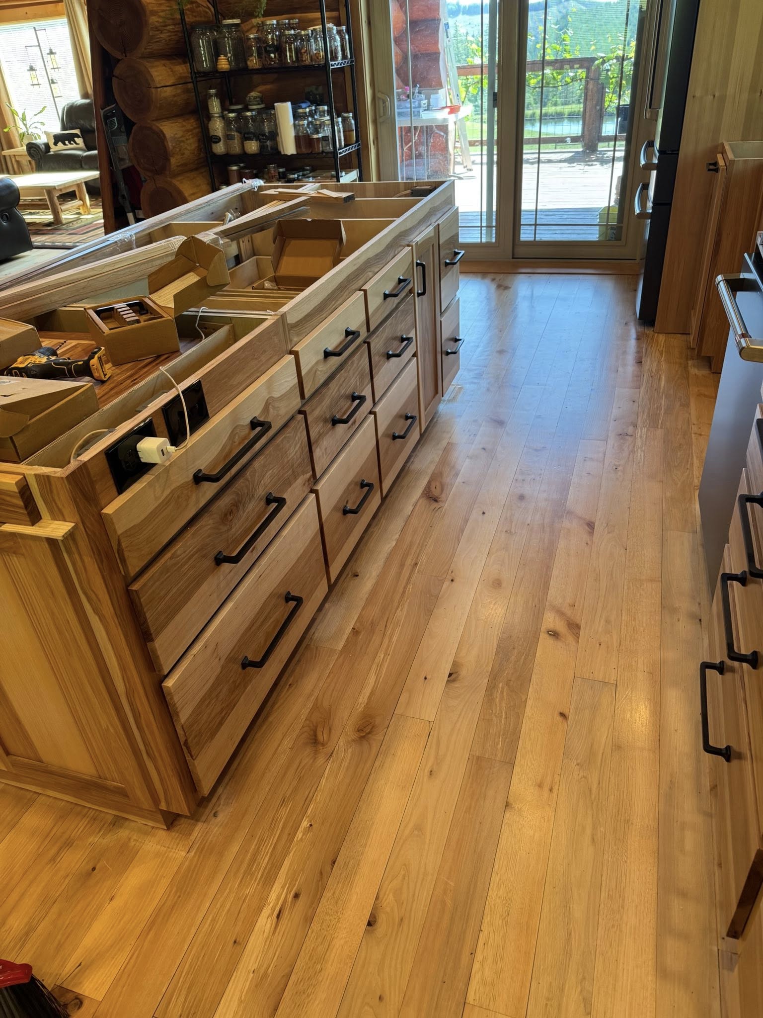 A spacious kitchen featuring numerous drawers and cabinets for ample storage and organization.